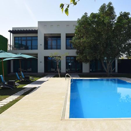 瑞塔萨尔瓦-维希瑟勒斯亭斯水疗度假酒店 多哈 外观 照片 A villa in Al Reef