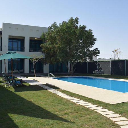瑞塔萨尔瓦-维希瑟勒斯亭斯水疗度假酒店 多哈 外观 照片 A villa in Al Reef